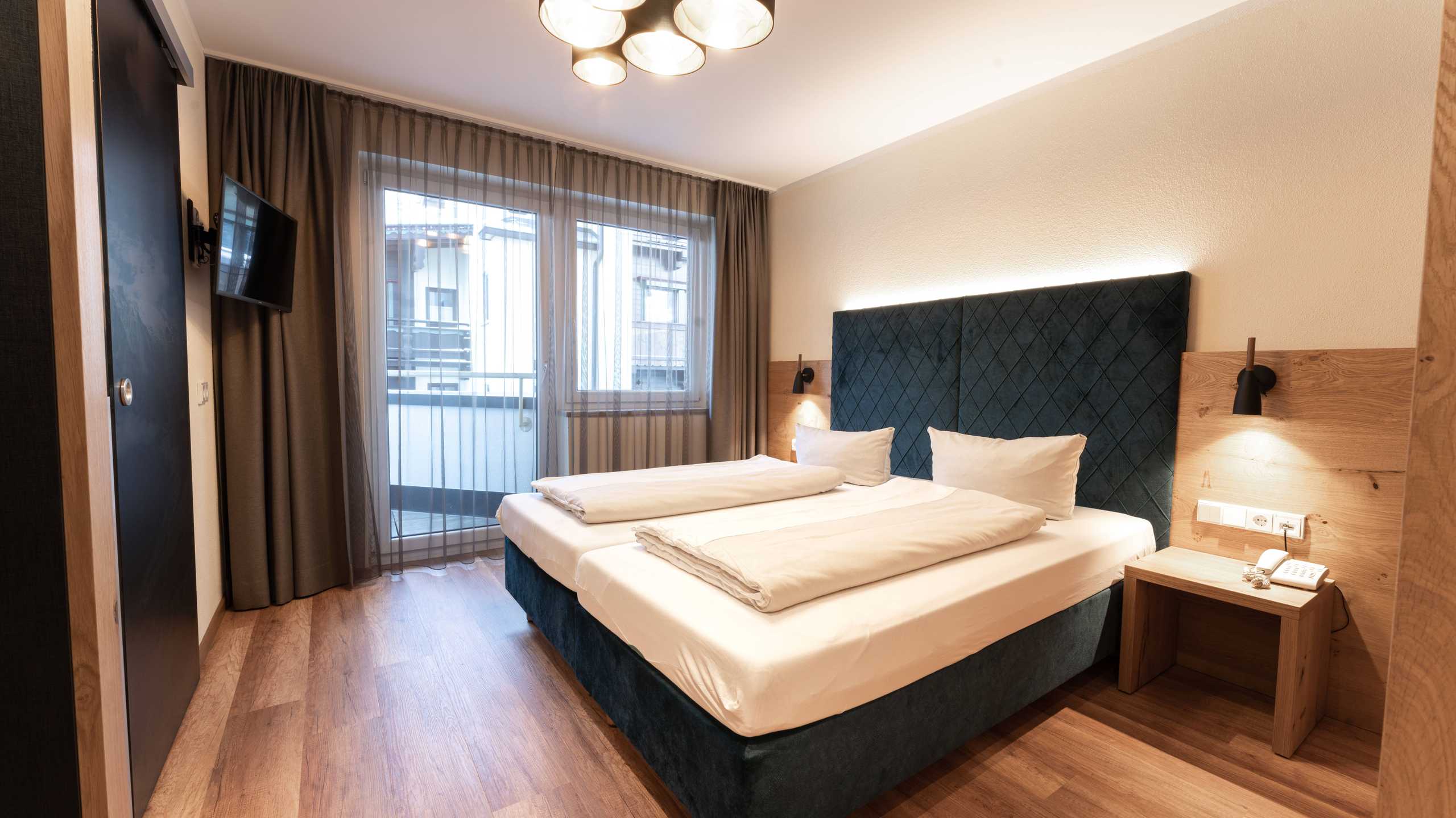 Dorfplatzl Zimmer Suite Penken